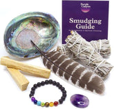 Purple Canyon Sage Smudge Gift Set with white sage sticks, palo santo, abalone shell, smudging feather, chakra bracelet, amethyst stone, and smudging guide